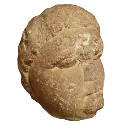 Celtic stone head. Exceptional origin. Main view of the sculpture