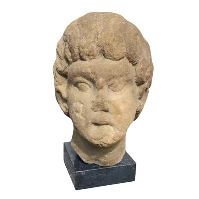 Head of Apollo. Gallo-Roman art.  Important bust of Apollo with hair tied back. Main view of the sculpture