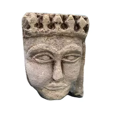 Corbel depicting a crowned queen. Romanesque art Poitou. Main view of the sculpture