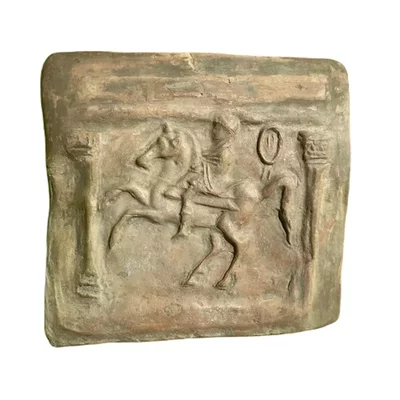 Roman votive plaque. Horseman between two columns. Main view of the sculpture