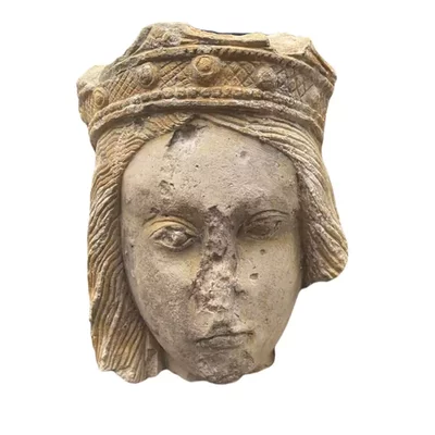 French crowned queen's head. Champagne. Main view of the sculpture